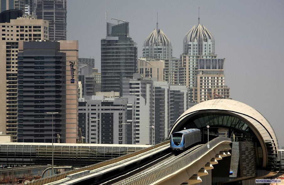 34.       Sheikh Zayed  .                  .    «Dubai World»             «»      ,         . (KARIM SAHIB/AFP/Getty Images)