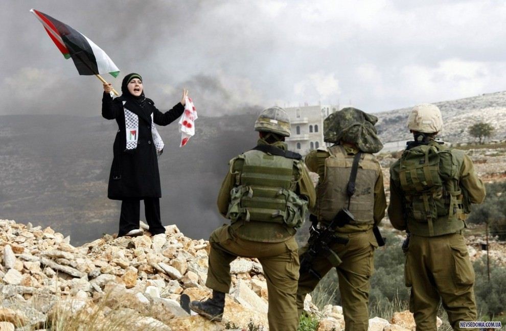 12)                .           8  2009 .  ,   ,      ,   .           «Hamas»   . (REUTERS/Eric Gaillard)