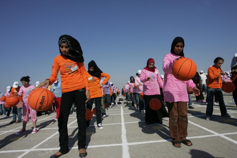 Gaza children dribble basketballs in record bid
