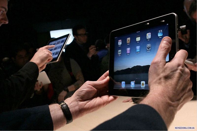 2.   iPad   «  »  iPhone,  «    ». (Justin Sullivan/Getty Images)