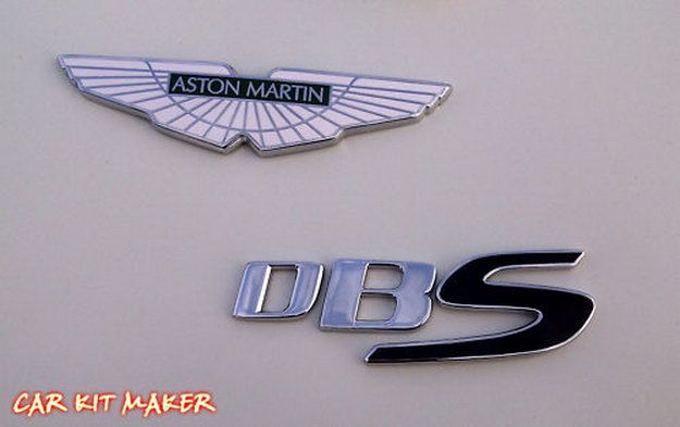   Jaguar XK8 -    Aston Martin (12 +)